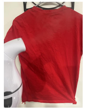 Prototype device holding the shirt taut so that it may be steamed